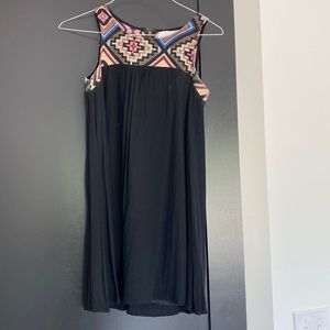 Black mini with neck detail